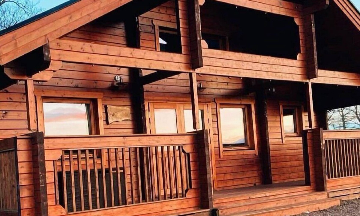 Gorebridge Cabin | A traditional Scandinavian style lodge, with stylish wooden interior decorated with a Scottish theme
