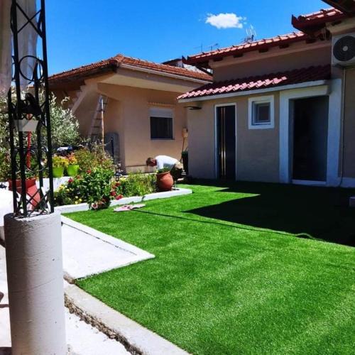 Olympiada House | Anastelia Apartments - The Backyard