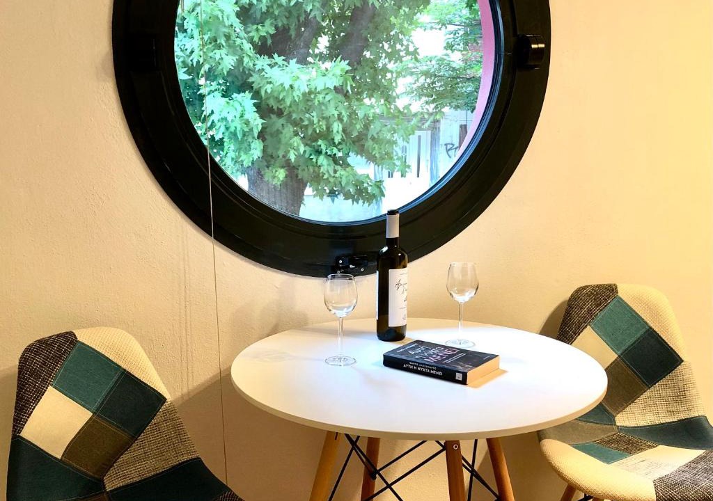 Edessa Apartment | Central & Riverfront Room 1