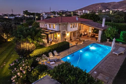 Kalyvia Thorikou Villa | Divine Stone House