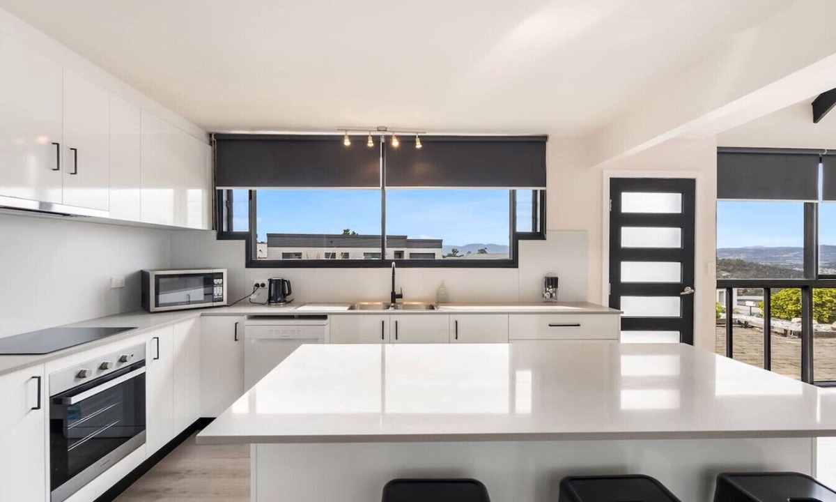 Claremont Apartment | Expansive River-View Oasis