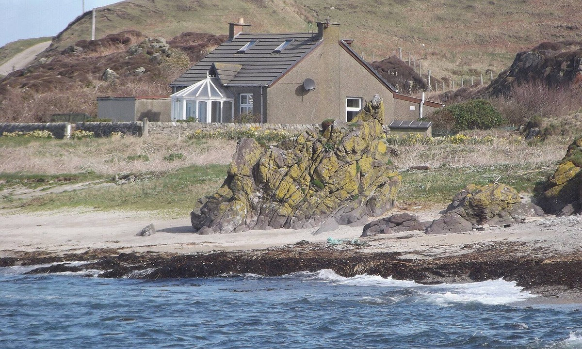 Bellochantuy Cottage | A detached cottage with views across to Gigha and the Paps of Jura.