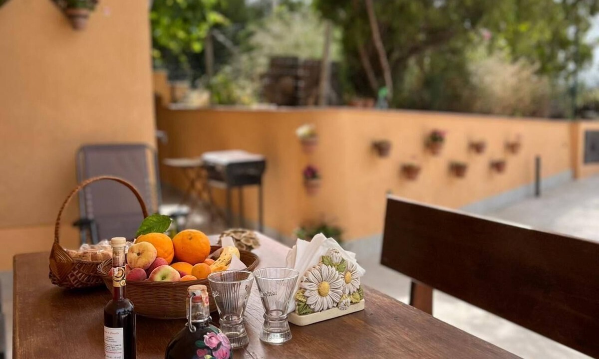 Castelbuono Apartment | ground-floor apartment with two br and living r, terrace and private parking