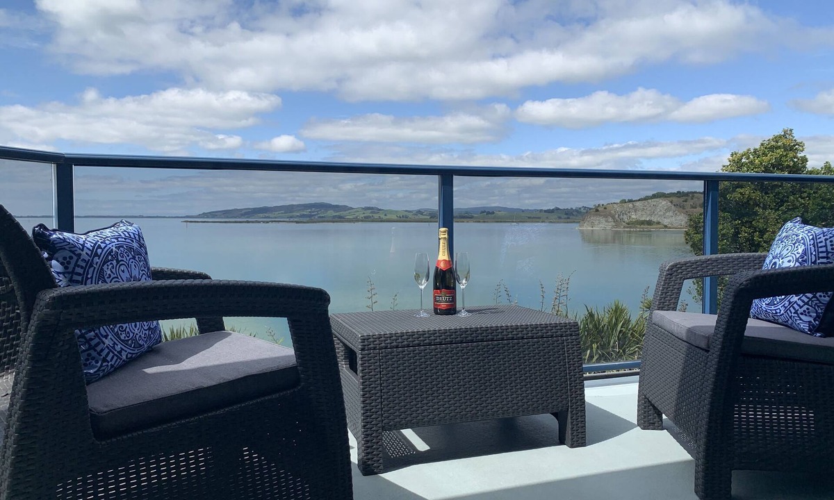 Onerahi Apartment | Harbour views from super spacious upstairs apartment. Fully equipped.