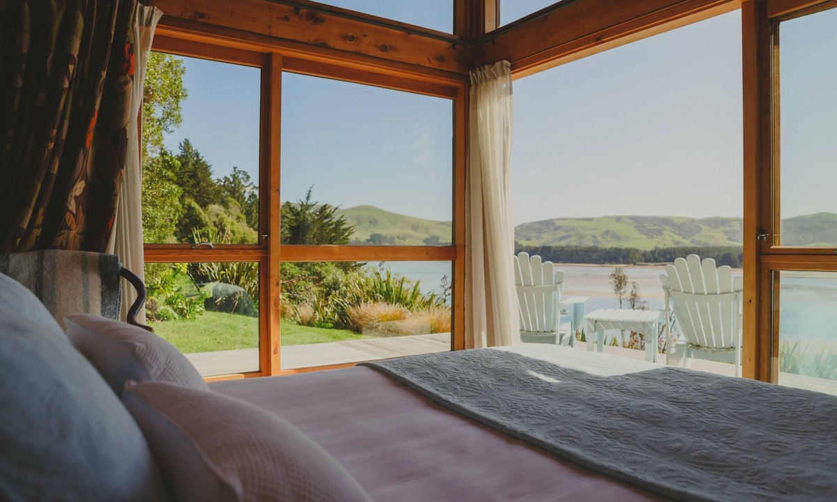 Cape Saunders Resort | Kahu Studio Wake up with a stunning view from the Papanui Inlet