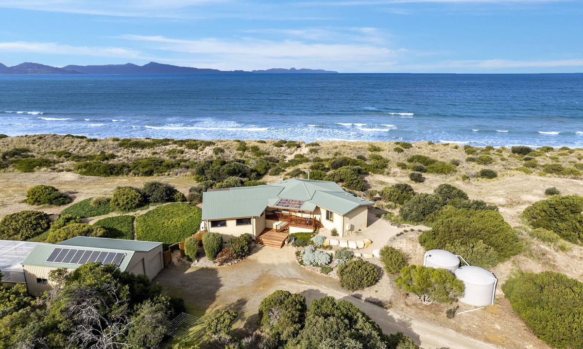 Dolphin Sands House | Peace & Plenty - beachfront hideaway with an indoor heated pool