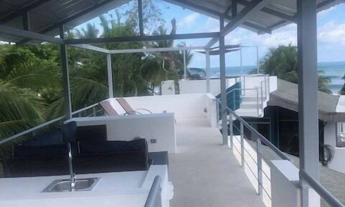 Esterillos Oeste Villa | Relax and enjoy sea breezes and sea views on the roof top patio.