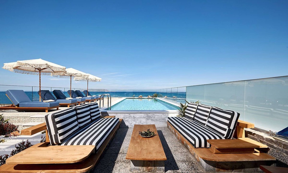 Kokkini Chani Villa | Seafront Villa with swimming pool & jacuzzi & heated pool