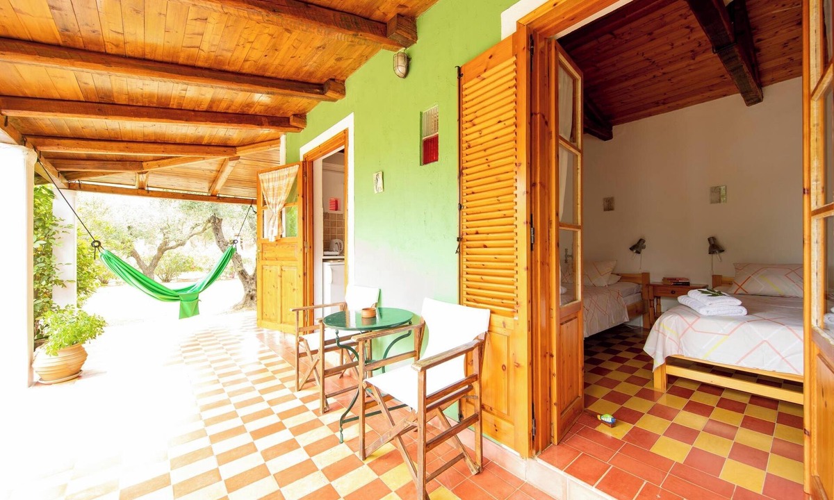 Vasilikos Cottage | Self catered Daphnes cottage #4 with large veranda and garden near the beach.