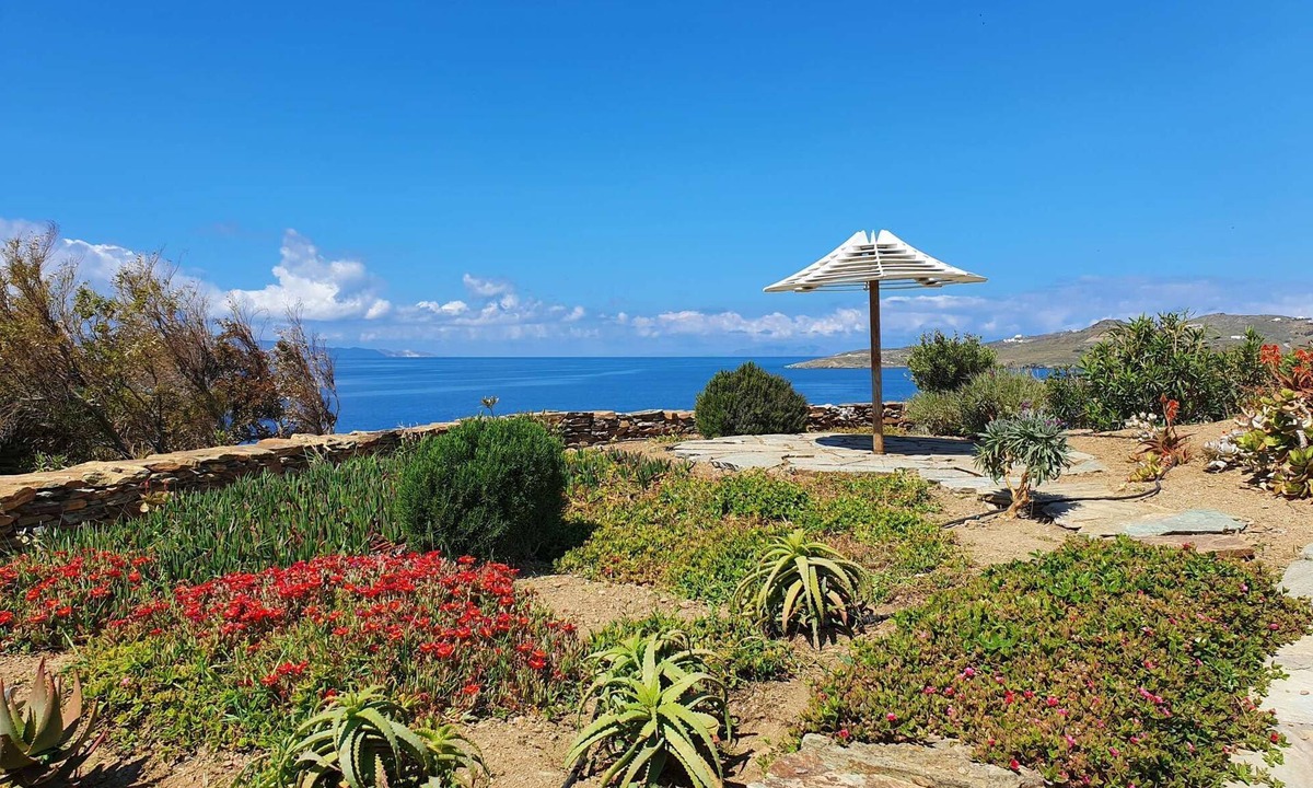 Tinos House | Windmill and houses by the sea // Stavros Bay