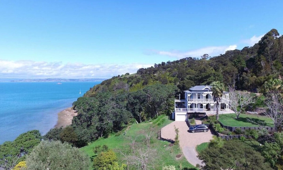 Oneroa House | With a private beach and secluded location