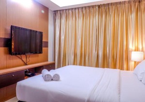 2BR Apartment Cozy Pool View Kemang Village with Access to Mall By Travelio