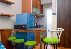 Beautiful 2BR with Direct Access to Pool Green Bay Pluit Apartment By Travelio
