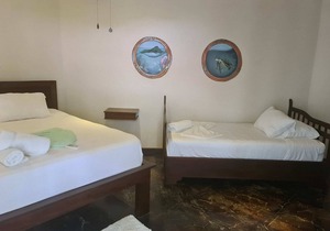 Cano Island Family Room at Hona Beach Hotel