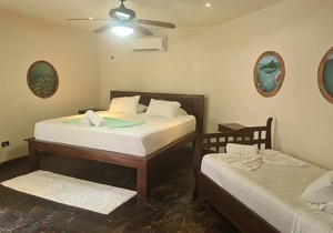 Cano Island Family Room at Hona Beach Hotel