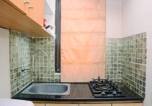 Cozy Living with Modern Design 1BR Kebagusan City Apartment By Travelio
