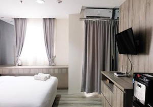 Minimalist Studio Room at Bintaro Icon Apartment By Travelio