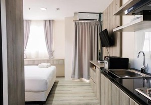 Minimalist Studio Room at Bintaro Icon Apartment By Travelio