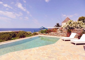Unique stone villa with a swimming pool and sea view in Koundouros