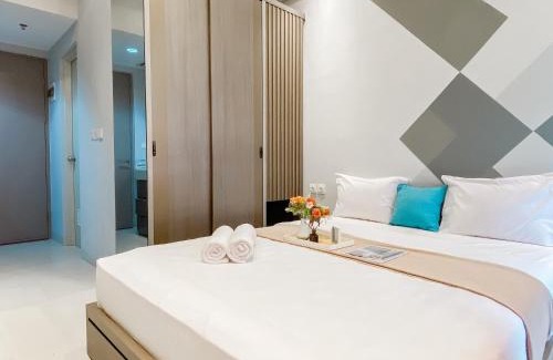 Cikarang Apartment | Cozy Living Studio Vasanta Innopark Apartment By Travelio