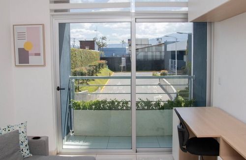 Cinco Esquinas Apartment | Modern apartment in condominium with pool