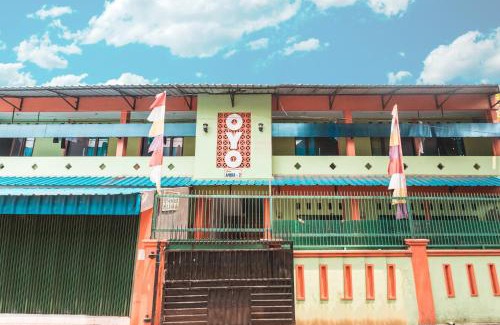 Rawalumbu Hotel | OYO Living 1756 Amira Guest House