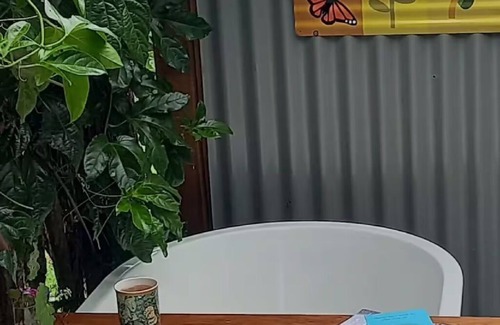 Ngaruawahia Cottage | Retreat into nature, in rural Ngaruawahia.nRelax in the outdoor bath.