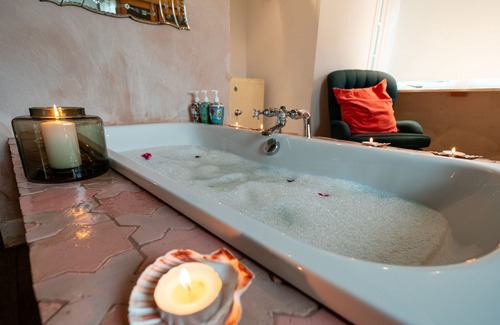 Balquhidder House | Sleeps 10. The Old pink library by loch and river