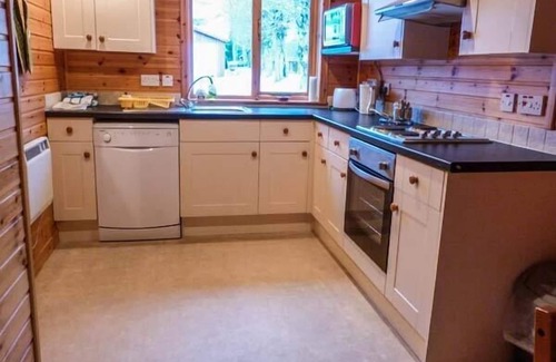 Aviemore Cottage | STRATHAVON CHALET, pet friendly, with a garden in Aviemore