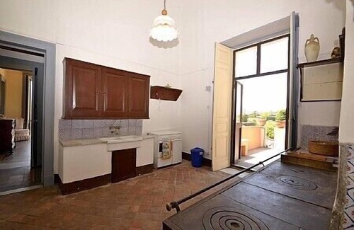 Viagrande House | Villa Carlina C: A characteristic and welcoming apartment that is part of an ancient manor house.