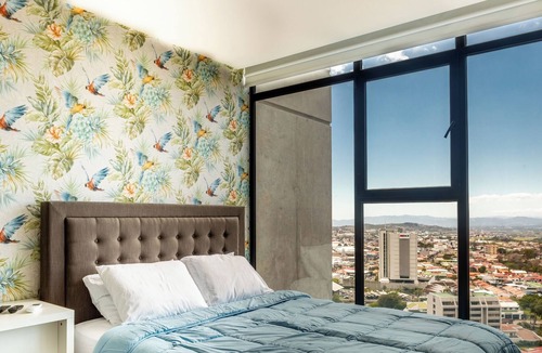 Rohrmoser Apartment | 19th floor, Luxe & Tropical with spectacular view