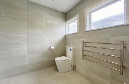 Browns Bay House | 7BR 3BH Beach Escape. 2 min to Browns Bay Beach