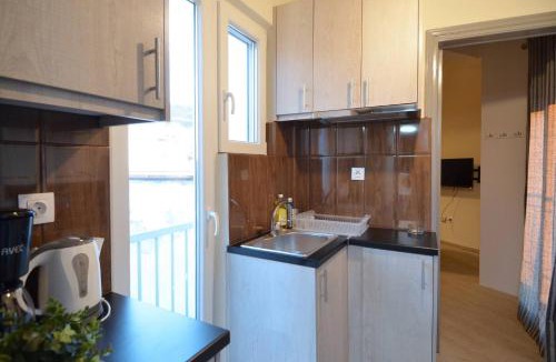 Ano Kipseli Apartment | A minimal retire at Kypseli with an amazing view