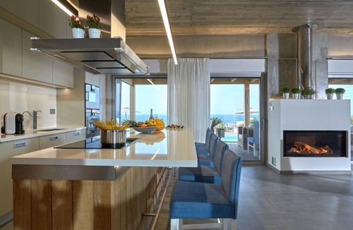 Vathianos Kampos Villa | Amazing location and views with a heated covered pool