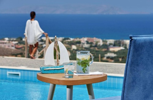 Vathianos Kampos Villa | Amazing location and views with a heated covered pool