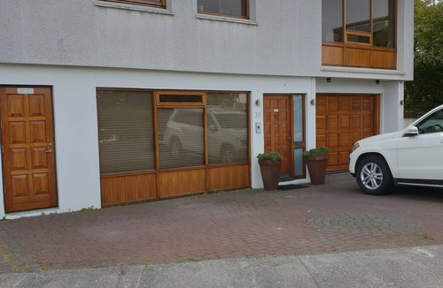 Laugardalur Apartment | Apartm. in a family house with 2 bedr. and a living room with 2 beds