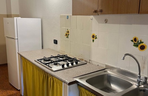 Palmi Apartment | Apartment 'La Quiete - Veranda Piccola 1' with Shared Pool, Wi-Fi and Air Conditioning
