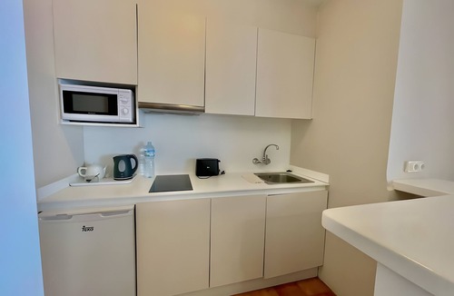Cala en Porter Apartment | Apartment Magda in Cala En Porter with Private Pool, Wi-Fi, and Air Conditioning