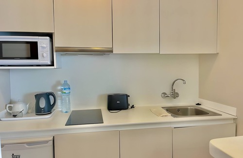 Cala en Porter Apartment | Apartment Magda in Cala En Porter with Private Pool, Wi-Fi, and Air Conditioning