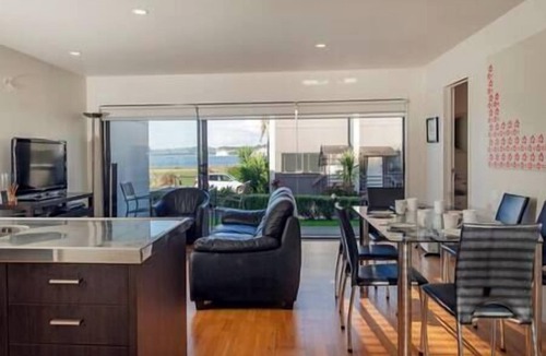 Whitianga Apartment | Beach views from apartment at Aqua Soleil complex with lap pool & spa.