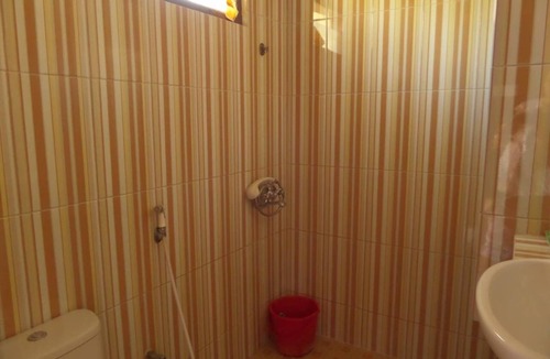 Tengger Caldera Bed & Breakfast | Bedroom for 4 person view direct to Mt. Bromo