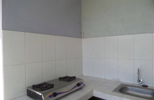 Bangli Bed & Breakfast | Bedroom of 5 pax Gold Kintamani