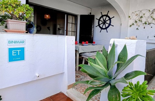 Cala en Porter Apartment | Binimar Apartment – Cala En Porter with Shared Pool, Near the Beach