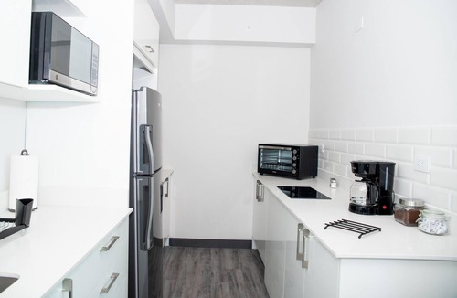 Hospital Apartment | Blue Nun at 29, City Views and Wonderland Vibes!
