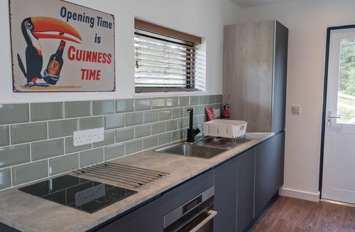 Balfron Cabin | Cabin, with deck and outside bath in woodlands