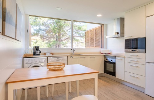 Cala San Vicente Apartment | 'Can Botana 12' with Mountain View, Wi-Fi and Air Conditioning