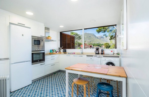Cala San Vicente Apartment | "Can Botana 9" with Mountain View, Pool, Air Conditioning, Balcony & Garden