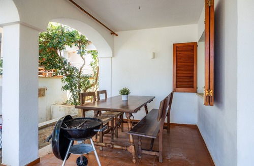 Cala San Vicente Apartment | "Can Botana 9" with Mountain View, Pool, Air Conditioning, Balcony & Garden