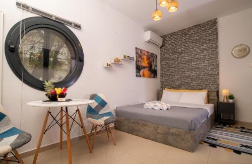 Edessa Apartment | Central & Riverfront Room 1