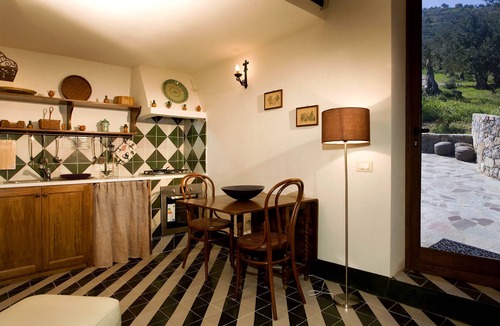 Campofelice di Roccella Ski Chalet | Charming white house with sea view and swimming pool